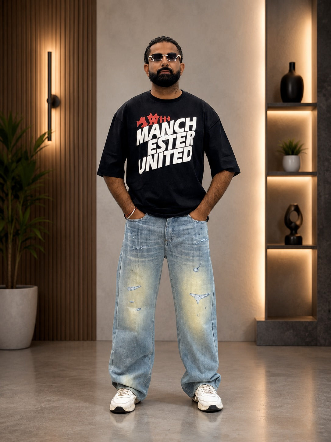 Men's Streetwear Look: Black Graphic Tee & Baggy Jeans